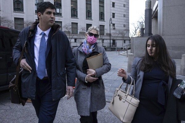 Nadine Menendez, center, wife of former U.S. Sen. Bob Menendez, leaves Manhattan federal court, Tuesday, March 18, 2025, in New York. (AP Photo/Yuki Iwamura)