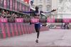 Kenya's Kelvin Kiptum crosses the finish line to win the men's race at the London Marathon on Sunday, April 23, 2023 in London.  (AP Photo/Alberto Pezzali)