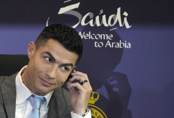 FILE - Cristiano Ronaldo speaks during a press conference for his official unveiling as a new member of Al Nassr soccer club in in Riyadh, Saudi Arabia, Tuesday, Jan. 3, 2023. Cristiano Ronaldo has come under heavy criticism after seemingly making an offensive gesture following Al Nassr’s 3-2 victory over Al Shabab in a Saudi Pro League match on Sunday, Feb. 25, 2024. (AP Photo/Amr Nabil, File)