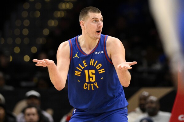 Jokic's 35 points pace Nuggets in 115-112 win over short-handed