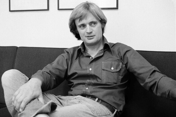 FILE - David McCallum, star of the NBC-TV series "The Invisible Man," is shown during an interview with Jay Sharbutt at NBC studios in New York, Aug. 28, 1975. McCallum, who became a teen heartthrob in the hit series "The Man From U.N.C.L.E." in the 1960s and was the eccentric medical examiner in the popular "NCIS" 40 years later, died on Monday, Sept. 25, 2023. He was 90. He died of natural causes surrounded by family at New York Presbyterian Hospital, CBS said in a statement. (AP Photo/Richard Drew, File)