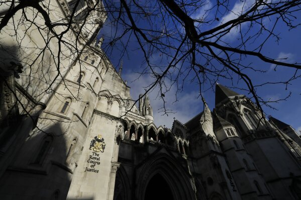 A view of The Royal Courts Of Justice, in London, Tuesday, Jan. 19, 2021. Meghan, the Duchess of Sussex will ask a High Court judge to rule in her favour in her privacy action against the Mail on Sunday over the publication of a handwritten letter to her estranged father. (AP Photo/Kirsty Wigglesworth)