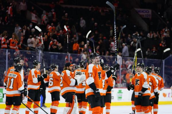 Philadelphia Flyers players react after an NHL hockey game against the Ottawa Senators, Friday, April 29, 2022, in Philadelphia. (AP Photo/Matt Slocum)