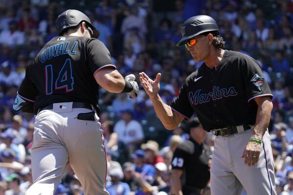 Marlins knock out Cubs in 11th