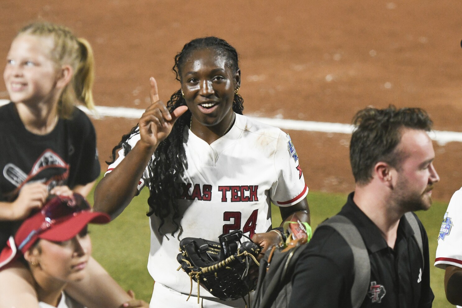 Chiefs QB Patrick Mahomes, Texas Tech hoops and football coaches cheering Red Raiders at WCWS