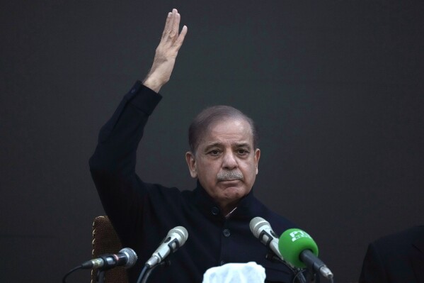 Pakistan's former Prime Minister Shehbaz Sharif gestures during a press conference regarding parliamentary elections, in Lahore, Pakistan, Tuesday, Feb. 13, 2024. Sharif, the main political rival of ex-Pakistani premier Imran Khan challenged him Tuesday to form a government if he had the support of the majority of the newly elected lawmakers in the parliament. (APPhoto/K.M. Chaudary)