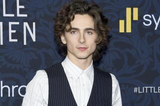 FILE - Actor Timothee Chalamet attends the premiere of "Little Women" in New York on Dec. 7, 2019. Chalamet will play Willy Wonka in a musical based on the early life of the eccentric chocolatier. Warner Bros. said the film will “focus on a young Willy Wonka and his adventures prior to opening the world’s most famous chocolate factory.” (Photo by Evan Agostini/Invision/AP, File)