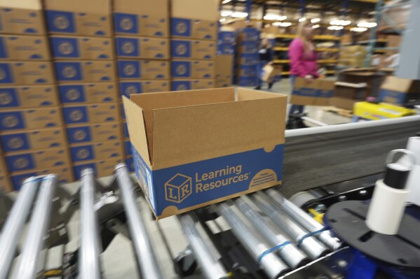 A shipping parcel for Learning Resources, an educational toy company whose products are manufactured in China, is shown at a warehouse in Vernon Hills, Ill., Friday, April 11, 2025. (AP Photo/Nam Y. Huh)