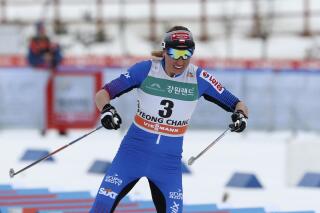 FILE - Winner Justyna Kowalczyk of Poland skis during the ladies skiathlon 7.5 km classic and 7.5 km free event of the FIS Cross Country World Cup in Pyeongchang, South Korea, Saturday, Feb. 4, 2017. Poland's Alpinism authorities say that climber Kacper Tekieli, husband of Justyna Kowalczyk, Polish multiple Olympic and World champion in cross-country skiing, has died tragically in Swiss Alps. The body of 38-year-old Tekieli was found Thursday, May 18, 2021 under an avalanche. (AP Photo/Lee Jin-man, File)