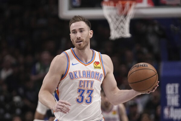 FILE - Oklahoma City Thunder's Gordon Hayward handles the ball in Game 3 of an NBA basketball second-round playoff series against the Dallas Mavericks, on May 11, 2024, in Dallas. Hayward, who nearly gave Butler a national title over Duke with a half-court shot that just missed on the final play of the 2010 NCAA men’s basketball championship game, retired from the NBA after 14 seasons on Thursday, Aug. 1, 2024. (AP Photo/Tony Gutierrez)