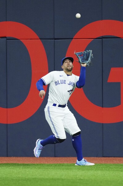 Biggio hit by pitch to force in tiebreaking run in 8th, Blue Jays beat  Phillies 2-1