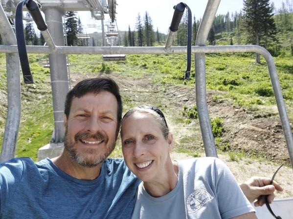 This June 4, 2023, photo shows Kell Morris, left, and his wife Jo Roop, in Sandpoint, Idaho. (Kell Morris via AP)