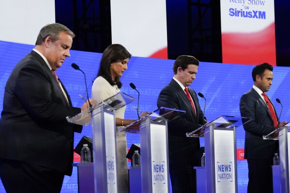 Republican presidential candidates from left, former New Jersey Gov. Chris Christie, former U.N. Ambassador Nikki Haley, Florida Gov. Ron DeSantis, and businessman Vivek Ramaswamy during a Republican presidential primary debate hosted by NewsNation on Wednesday, Dec. 6, 2023, at the Moody Music Hall at the University of Alabama in Tuscaloosa, Ala. (AP Photo/Gerald Herbert)