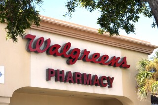 FILE - A Walgreens store in Bradenton, Fla., is shown on Feb. 9, 2024. The struggling drugstore chain Walgreens will get about $1.1 billion for selling another slice of its stake in drug distributor Cencora. (AP Photo/Gene J. Puskar, File)