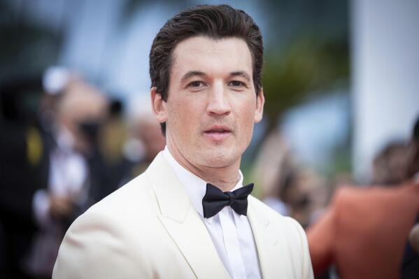 FILE - Miles Teller poses for photographers upon arrival at the premiere of the film "Top Gun: Maverick" at the 75th international film festival, Cannes, southern France, Wednesday, May 18, 2022. Teller will host the opening episode of the 48th season of “Saturday Night Live” on Oct. 1, 2022. (Photo by Vianney Le Caer/Invision/AP, File)