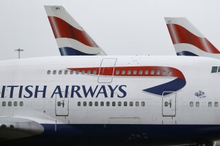 FILE - In this Tuesday, Jan. 10, 2017, file photo, British Airways planes are parked at Heathrow Airport in London. ﻿﻿﻿﻿﻿﻿﻿﻿A British Airways plane flew between New York and London in less than five hours, landing early Sunday, Feb. 9, 2020, at Heathrow Airport after leaving John F. Kennedy International Airport, setting a record for subsonic plane travel. (AP Photo/Frank Augstein, File)