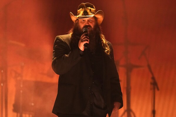 Chris Stapleton performs "We Don't Fight Anymore" at the 57th Annual CMA Awards on Wednesday, Nov. 8, 2023, at the Bridgestone Arena in Nashville, Tenn. (AP Photo/George Walker IV)
