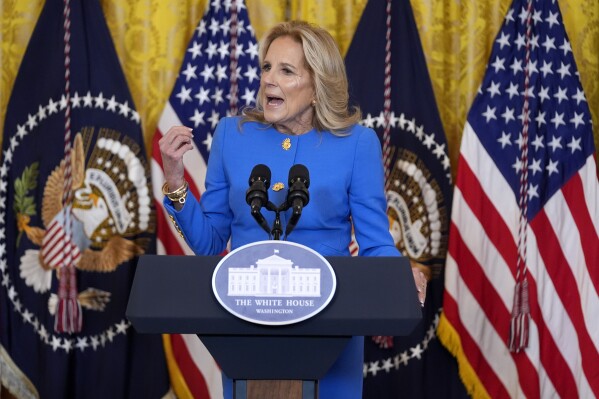 First lady Jill Biden speaks to the National Governors Association during an event in the East Room of the White House, Friday, Feb. 23, 2024, in Washington. (AP Photo/Evan Vucci)