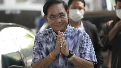 FILE - Thailand's Prime Minister Prayuth Chan-ocha arrives to cast his vote during a general election at a polling station in Bangkok, Thailand, on May 14, 2023. Prayuth, who served almost nine years in office after seizing power in a 2014 military coup, announced Tuesday, July 11, that he is leaving politics. (AP Photo/Sakchai Lalit, File)