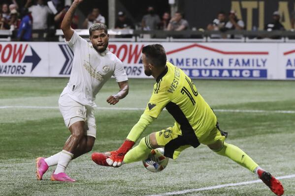 Atlanta United forward Josef Martinez has his shot blocked by Toronto FC goalkeeper Quentin Westberg during the second half of an MLS soccer match Wednesday, Aug. 18, 2021, in Atlanta. (Curtis Compton/Atlanta Journal-Constitution via AP)