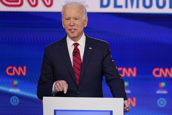 Former Vice President Joe Biden, participates in a Democratic presidential primary debate at CNN Studios, Sunday, March 15, 2020, in Washington. (AP Photo/Evan Vucci)