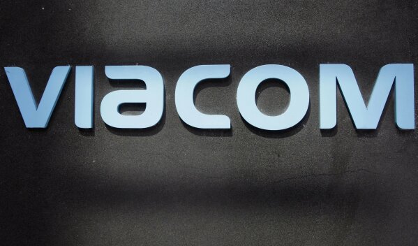 FILE - This Aug. 3, 2011, file photo, shows the Viacom logo at Viacom headquarters in New York. CBS and Viacom said Tuesday, Aug. 13, 2019, that they will reunite, bringing together their networks and the Paramount movie studio as traditional media giants bulk up to challenge streaming companies like Netflix. (AP Photo/Mark Lennihan, File)