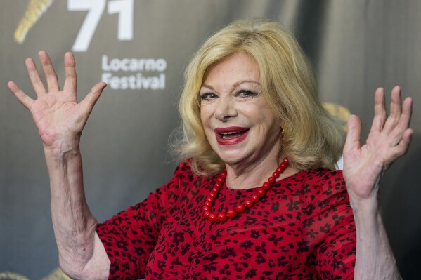 FILE - Italian actress Sandra Milo poses during a photocall for the film "Un nemico che ti vuole bene" during the 71st Locarno International Film Festival, Tuesday, Aug. 7, 2018, in Locarno, Switzerland. Sandra Milo, an icon of Italian cinema who played a key role in Federico Fellini’s 8½ and later became his muse, died Monday, Jan. 29, 2024, her family said. She was 90. (Alexandra Wey/Keystone via AP, File)