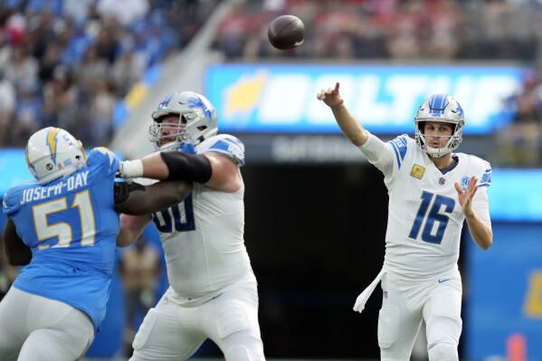 Detroit Lions quarterback Jared Goff (16) throws a pass during the first half of an NFL football against the Los Angeles Chargers game Sunday, Nov. 12, 2023, in Inglewood, Calif. (AP Photo/Ashley Landis)