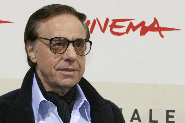 FILE - U.S. film director, writer and actor Peter Bogdanovich poses during a photo call for the presentation of the movie "The Dukes" at the Rome Film Festival in Rome on Oct. 23, 2007.  Bogdanovich, the Oscar-nominated director of "The Last Picture Show," and "Paper Moon," died Thursday, Jan. 6, 2022 at his home in Los Angeles. He was 82.  (AP Photo/Sandro Pace, File)