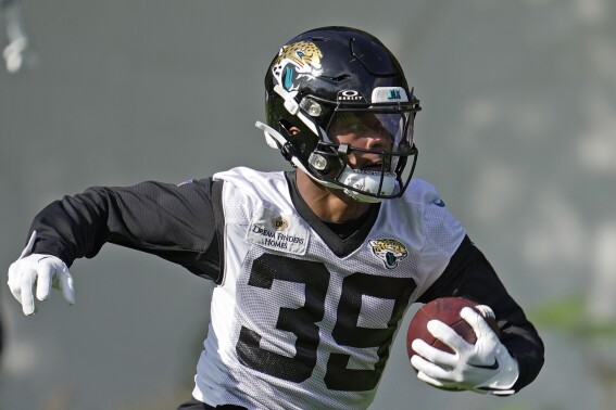 Jacksonville Jaguars' Jamal Agnew attends an NFL practice session in Watford, Hertfordshire, England, north-west of London, Friday, Sept. 29, 2022 ahead of the NFL game against Atlanta Falcons at the Wembley Stadium on Oct. 1, 2023. (AP Photo/Kin Cheung)