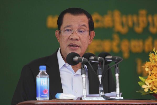 Cambodian Prime Minister Hun Sen delivers a speech at the launching ceremony of the Cambodia-China Friendship Preah Kossamak Hospital in Phnom Penh, Cambodia, Monday, March 21, 2022. Hun Sen declared Monday, March 28, 2022, that he would not appoint anyone to be a provincial governor who is not knowledgeable in the use of social media and smartphones. (AP Photo/Heng Sinith)