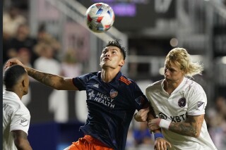 FILE - FC Cincinnati forward Brandon Vazquez goes after the ball as Inter Miami midfielder Brek Shea, right, defends during the first half of an MLS soccer match Saturday, Oct. 23, 2021, in Fort Lauderdale, Fla. American forward Brandon Vázquez transferred from Cincinnati to Mexico’s Monterrey on Wednesday, Jan. 10, 2024 agreeing to a four-year contract.(AP Photo/Marta Lavandier, File)