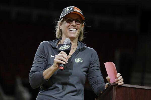 FILE - Seattle Storm owner Ginny Gilder speaks during a fan rally to celebrate the Storm winning the 2018 WNBA basketball championship, Sunday, Sept. 16, 2018, in Seattle. As Title IX marks its 50th anniversary this year, Gilder is one of countless women who benefited from the enactment and execution of the law, translating those opportunities into becoming leaders in their professional careers. (AP Photo/Ted S. Warren, File)