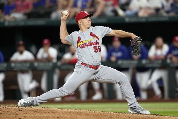 St. Louis Cardinals relief pitcher Ryan Helsley (56) delivers a pitch to the Texas Rangers during the ninth inning of a baseball game, Wednesday, June 7, 2023, in Arlington, Texas. The Cardinals won 1-0. (AP Photo/Jim Cowsert)
