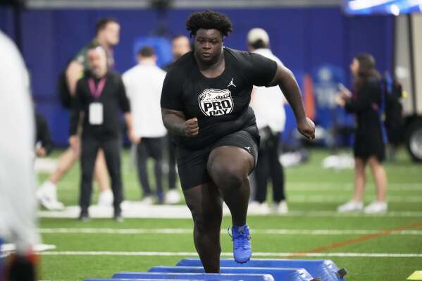Florida defensive lineman Desmond Watson runs through a drill during the school's NFL football pro day, March 27, 2025, in Gainesville, Fla. (AP Photo/John Raoux, File)