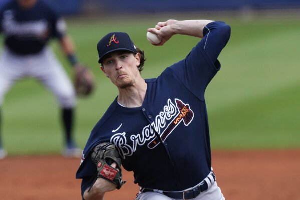 Atlanta Braves starting pitcher Max Fried (54) works against the Tampa Bay Rays in the first inning of a spring training baseball game Sunday, March 21, 2021, in Port Charlotte, Fla. (AP Photo/John Bazemore)