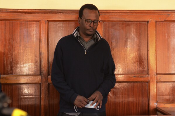 Kevin Adam Kinyanjui Kangethe appears at the Mililani law court in Nairobi, Kenya, on Jan. 31, 2024. The Nairobi police chief said early Thursday, Feb. 8, 2024, that Kangethe, a murder suspect who was awaiting extradition to the United States, had slipped out of a police station cell and jumped into one of the privately owned minivans that are the main transportation source in Kenya. (AP Photo)