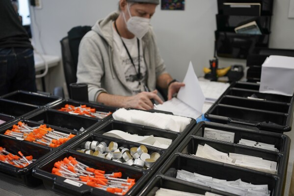 FILE - Supplies for drug users are seen at an overdose prevention center, OnPoint NYC, in New York, Feb. 18, 2022. The city of Providence, Rhode Island, on Thursday, Feb. 1, 2204, has approved the first state-sanctioned safe injection site, a place where people can use heroin and other illegal drugs and be revived if they overdose. The Providence site is the first sanctioned by the state and joins two other safe injection sites in New York that are already open. (AP Photo/Seth Wenig, File)