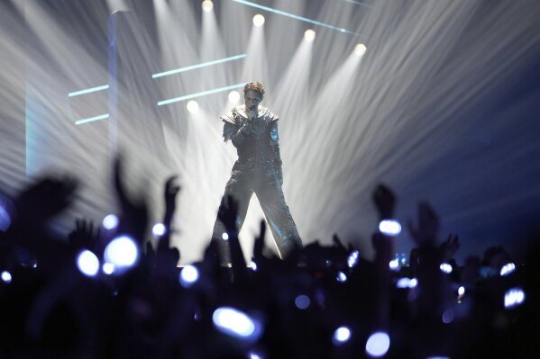 Kyle Alessandro from Norway performs the song 'Lighter' during the dress rehearsal for the first semi-final of the 69th Eurovision Song Contest, in Basel, Switzerland, Monday, May 12, 2025. (AP Photo/Martin Meissner)