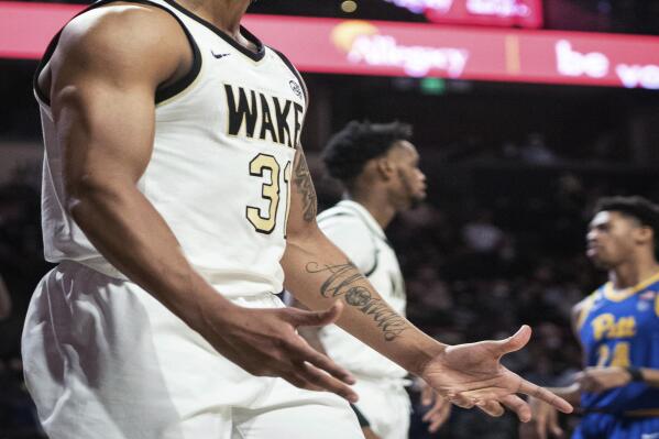 Wake Forest guard Alondes Williams (31) reacts to a call during the first half of the team's NCAA college basketball game against Pittsburgh on Wednesday, Feb. 2, 2022, in Winston-Salem, N.C. (Allison Lee Isley