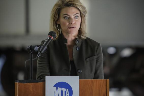 FILE - This photo from Tuesday May 19, 2020, shows Sarah Feinberg, Interim President, MTA New York City Transit, during a news conference in New York. Feinberg, who is stepping down from her position, said the NYC transit job has cut severely into her time with her family. (AP Photo/Frank Franklin II, File)