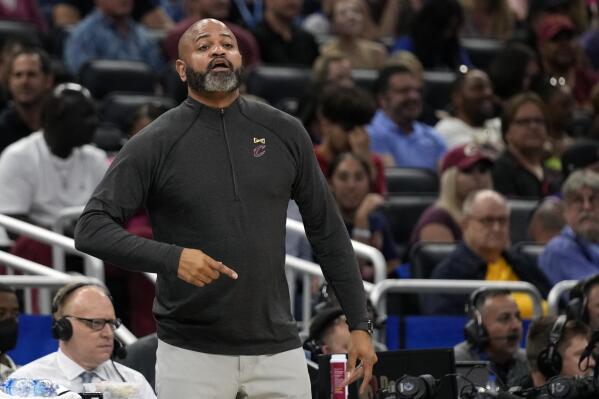 Cleveland Cavaliers head coach J.B. Bickerstaff directs his players on the court during the first half of an NBA basketball game against the Orlando Magic, Tuesday, April 4, 2023, in Orlando, Fla. (AP Photo/John Raoux)