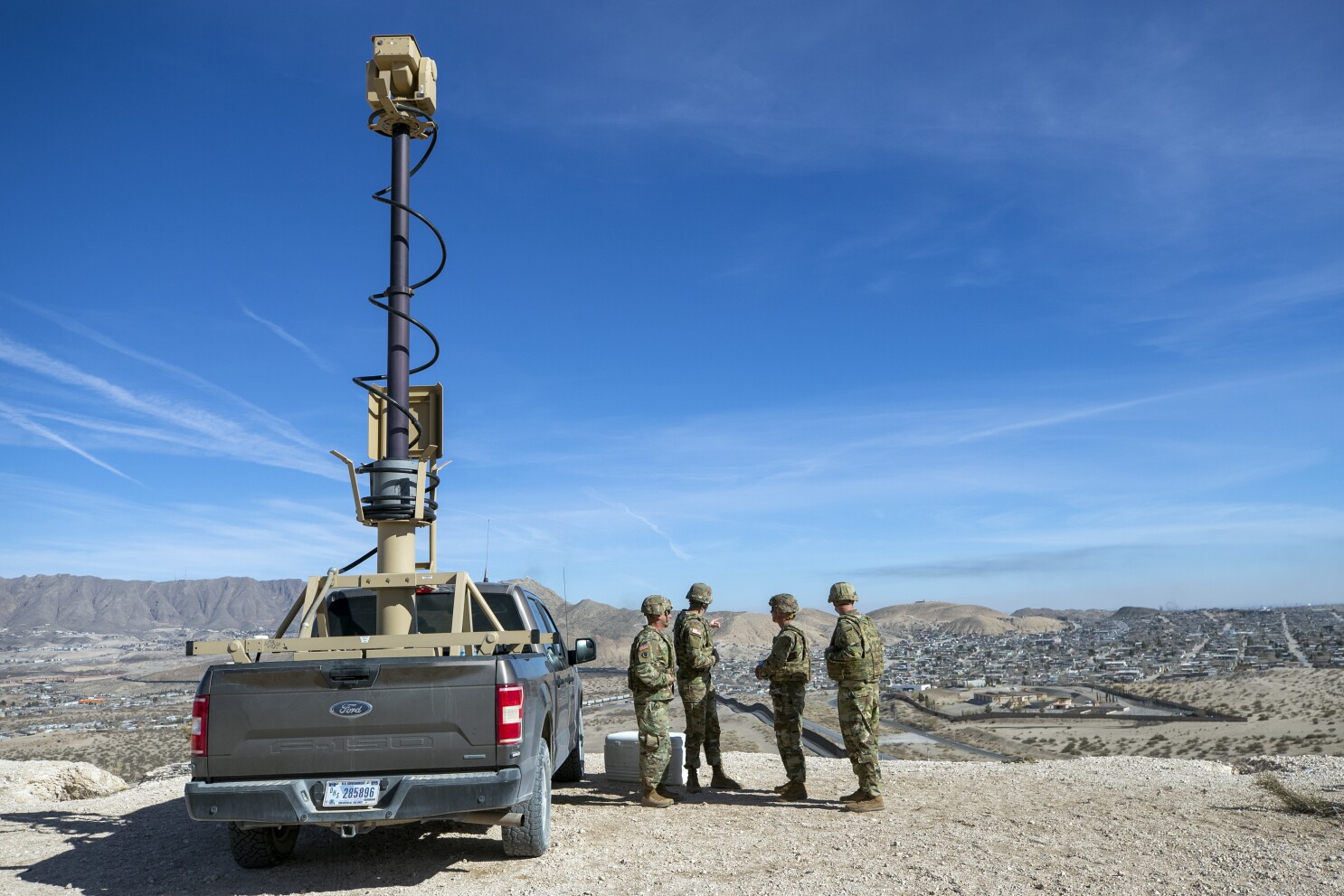 Troops begin detaining immigrants in national defense zone at border in escalation of military role