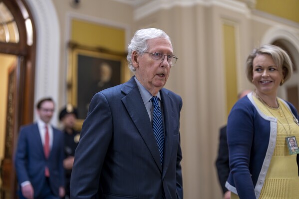 Senate Minority Leader Mitch McConnell, R-Ky., walks to his office as the Senate prepares to advance the $95 billion aid package for Ukraine, Israel and Taiwan passed by the House, at the Capitol in Washington, Tuesday, April 23, 2024. (AP Photo/J. Scott Applewhite)