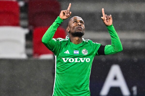 Maccabi Haifa's Gadi Kinda celebrates after scoring his side's second goal during the Europa Conference League round of 16 first leg soccer match between Maccabi Haifa and Fiorentina at the Boszik Arena in Budapest, Thursday, March 7, 2024. (AP Photo/Denes Erdos, File)