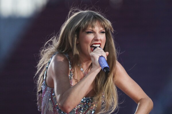 FILE - Taylor Swift performs at Levi's Stadium in Santa Clara, Calif. Friday, July 28, 2023. California's lieutenant governor and other elected officials on Tuesday, Aug. 1,2 023, urged Taylor Swift to postpone her Los Angeles concerts as a way to stand in solidarity with striking hotel workers. (Jessica Christian/San Francisco Chronicle via AP, FIle)