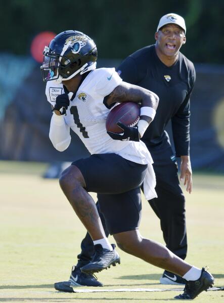 Jags' Etienne completes comeback by getting leveled in camp