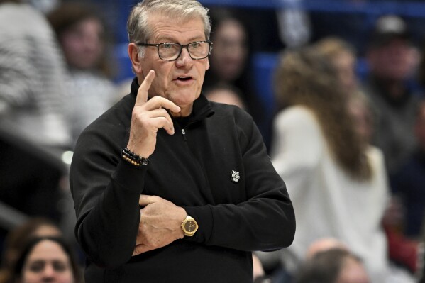 UConn head coach Geno Auriemma directs his team during the second half of an NCAA college basketball game against Seton Hall, Wednesday, Feb. 7, 2024 in Hartford, Conn. (Cloe Poisson/Hartford Courant via AP)