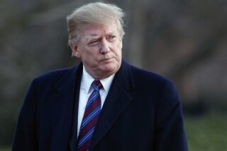FILE- In this Friday, Feb. 8, 2019, file photo President Donald Trump arrives on Marine One on the South Lawn of the White House in Washington. Trump plans to sign an executive order directing federal agencies to prioritize research and development in artificial intelligence. The plan, called the American AI Initiative, comes after China and other countries have pledged big investments to advance and apply AI technology in fields ranging from warfighting to health care. (AP Photo/Carolyn Kaster, File)