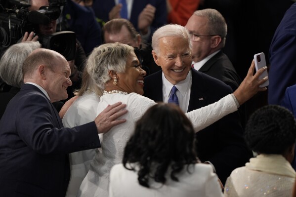 President Joe Biden takes a photo before he delivers the State of the Union address on Capitol Hill, Thursday, March 7, 2024, in Washington. (AP Photo/Mark Schiefelbein)